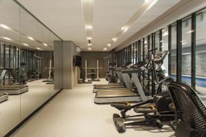 a gym with several treadmills and cardio machines at B TWINS - Vacaciones Soñadas a metros del Mar in Pinamar