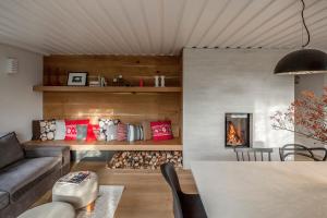 Posedenie v ubytovaní Finest Ski Chalet Leogang by All in One Apartments