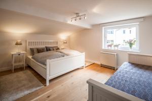 Posteľ alebo postele v izbe v ubytovaní Finest Ski Chalet Leogang by All in One Apartments