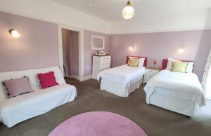 Cama ou camas em um quarto em Eastwrey Barton Country House