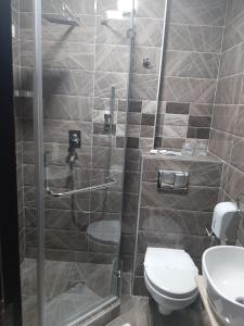 Koupelna v ubytování Hotel Usce