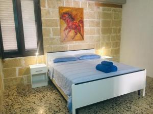 Postel nebo postele na pokoji v ubytování Salento Appartamenti
