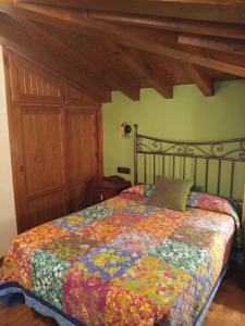 Postel nebo postele na pokoji v ubytování CASA RURAL LA MONTESINA