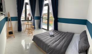 Postel nebo postele na pokoji v ubytování November Villa Đà Lạt