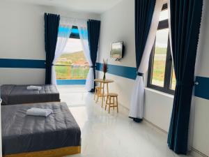 Postel nebo postele na pokoji v ubytování November Villa Đà Lạt