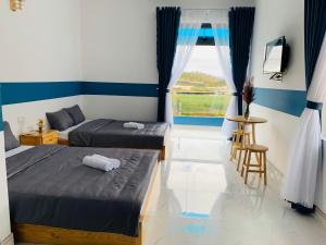 Postel nebo postele na pokoji v ubytování November Villa Đà Lạt