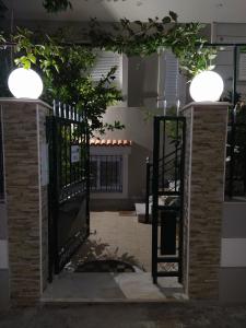 an entrance to a building with wrought iron gates at SeaSide Apartment Rio in Rio