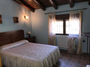 Postel nebo postele na pokoji v ubytování Cortijo Álamo 2 + 17 fotografií