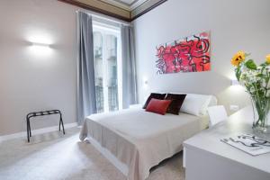 Posteľ alebo postele v izbe v ubytovaní Donna Isa B&B