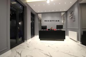 a lobby with a reception desk in a building at Hira Hotel in Istanbul