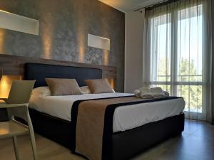 Posteľ alebo postele v izbe v ubytovaní Resort Il Mulino