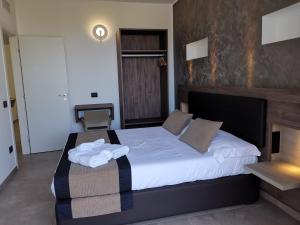 Posteľ alebo postele v izbe v ubytovaní Resort Il Mulino