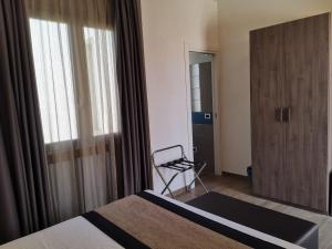 Posteľ alebo postele v izbe v ubytovaní Resort Il Mulino