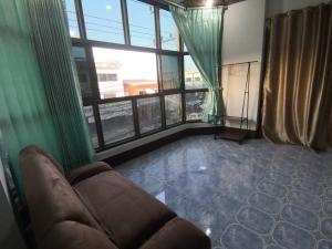 Posezení v ubytování บ้านพรศรี Homestay