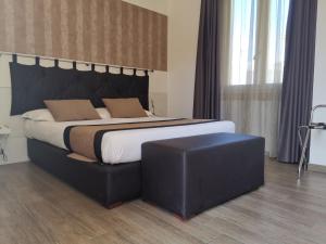 Posteľ alebo postele v izbe v ubytovaní Resort Il Mulino