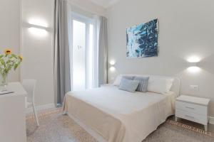 Posteľ alebo postele v izbe v ubytovaní Donna Isa B&B