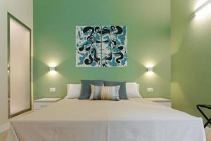 Posteľ alebo postele v izbe v ubytovaní Donna Isa B&B