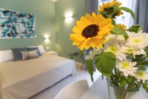 Posteľ alebo postele v izbe v ubytovaní Donna Isa B&B