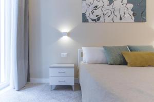 Posteľ alebo postele v izbe v ubytovaní Donna Isa B&B
