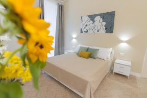 Posteľ alebo postele v izbe v ubytovaní Donna Isa B&B