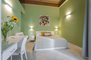 Posteľ alebo postele v izbe v ubytovaní Donna Isa B&B