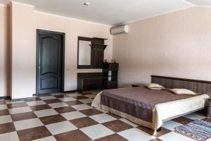Cama o camas de una habitación en Dergachov Guest House