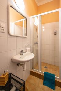Et badeværelse på Sweet Home by Ruterra