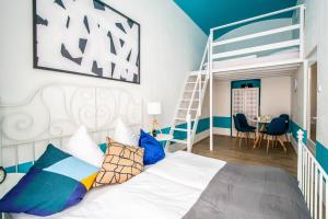 Llit o llits en una habitació de Sweet Home by Ruterra