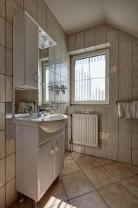 Kúpeľňa v ubytovaní Óvár Apartman