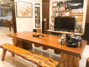 TV a/nebo společenská místnost v ubytování Green Park Homestay