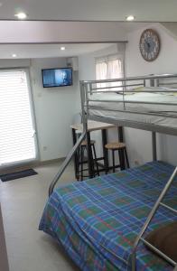 Postel nebo postele na pokoji v ubytování studio mezzanine 5 personnes