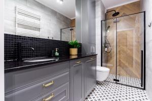 Kúpeľňa v ubytovaní Apartament 53 Długie Ogrody Gdańsk + 37 fotografií