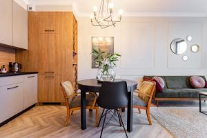 Kuchyňa alebo kuchynka v ubytovaní Apartament 53 Długie Ogrody Gdańsk