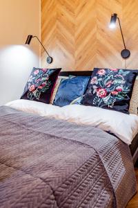 Posteľ alebo postele v izbe v ubytovaní Apartament 53 Długie Ogrody Gdańsk