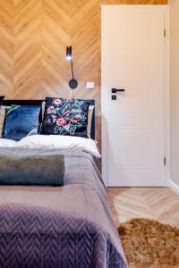 Posteľ alebo postele v izbe v ubytovaní Apartament 53 Długie Ogrody Gdańsk