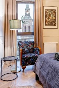 Posteľ alebo postele v izbe v ubytovaní Apartament 53 Długie Ogrody Gdańsk