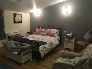 Postel nebo postele na pokoji v ubytování La Maison d'Olives