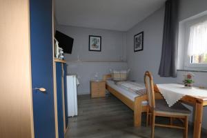 Postel nebo postele na pokoji v ubytování Haus Anne