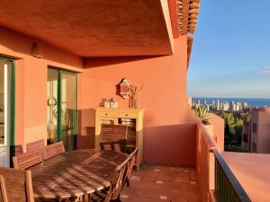 A balcony or terrace at PENTHOUSE BLUELINE IN SIERRA CORTINA