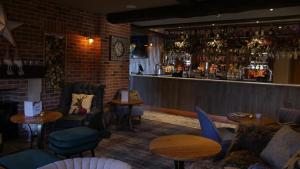 a restaurant with tables and chairs and a bar at The Station Restaurant & Bar in Doncaster +39 photos