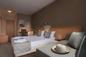 Postel nebo postele na pokoji v ubytování Hotel Eskada Beach