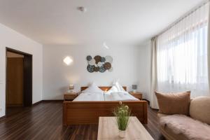 Posezení v ubytování Hotel Bartholomäus + 15 fotografií
