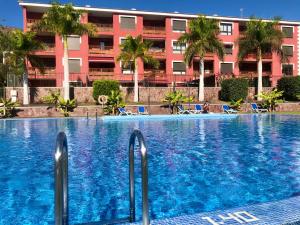 The swimming pool at or close to El Mocan Luxury Apartment