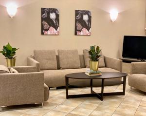 TV a/nebo společenská místnost v ubytování Hotel Arena Rooms - Berlin Mitte
