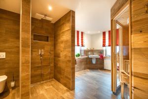 a bathroom with a shower and a sink at Große Wies in Oberstdorf +28 photos
