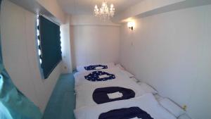 Krevet ili kreveti u jedinici u objektu Setouchi Triennale Hotel 301Art1 Female dormitory - Vacation STAY 61583