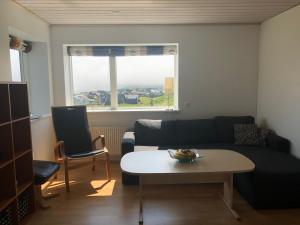 Area soggiorno di Light & spacious home