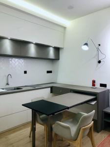 A kitchen or kitchenette at Corporate Lifestyle Studio {FREE WIFI} up to 4pax