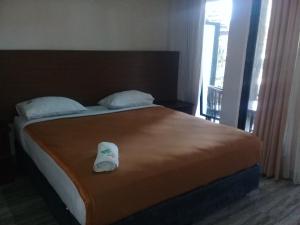 Voodi või voodid majutusasutuse RF Hotel toas