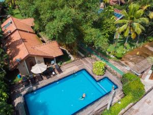 an overhead view of a swimming pool at a resort at Villa Shade in Negombo